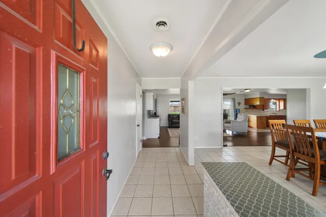 a hallway with dining room and livingroom view