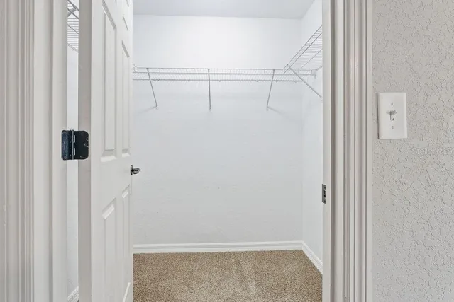 a view of a room with racks on the wall