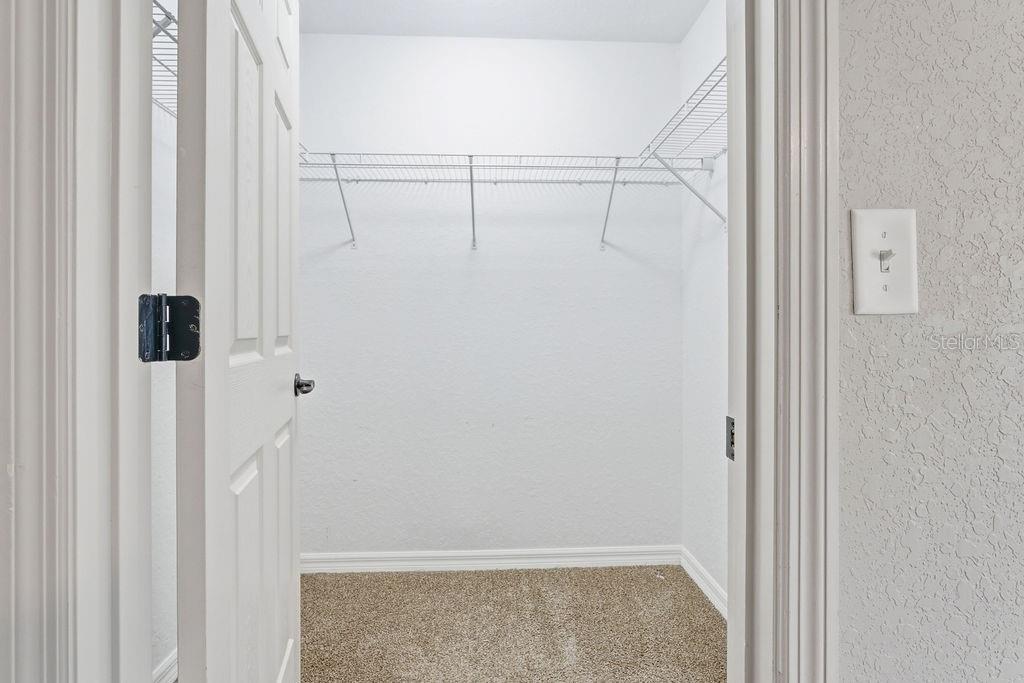 16592 Southwest 31st Circle Ocala, FL 34473 - Photo 19 of 27 a view of a room with racks on the wall