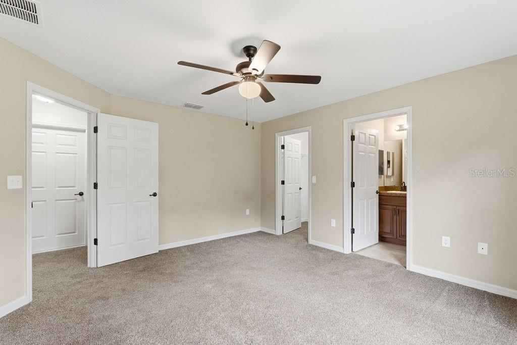 16592 Southwest 31st Circle Ocala, FL 34473 - Photo 21 of 27 a view of empty room with a ceiling fan
