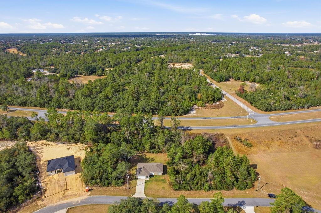 16592 Southwest 31st Circle Ocala, FL 34473 - Photo 3 of 27 a view of a city and lake view