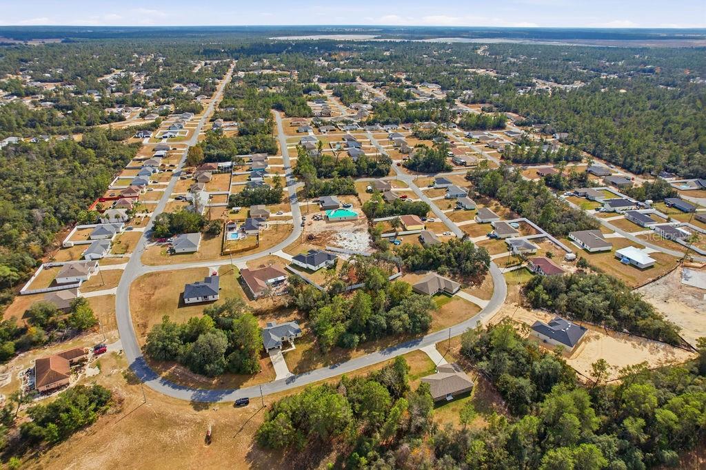 16592 Southwest 31st Circle Ocala, FL 34473 - Photo 5 of 27 an aerial view of residential building with parking space
