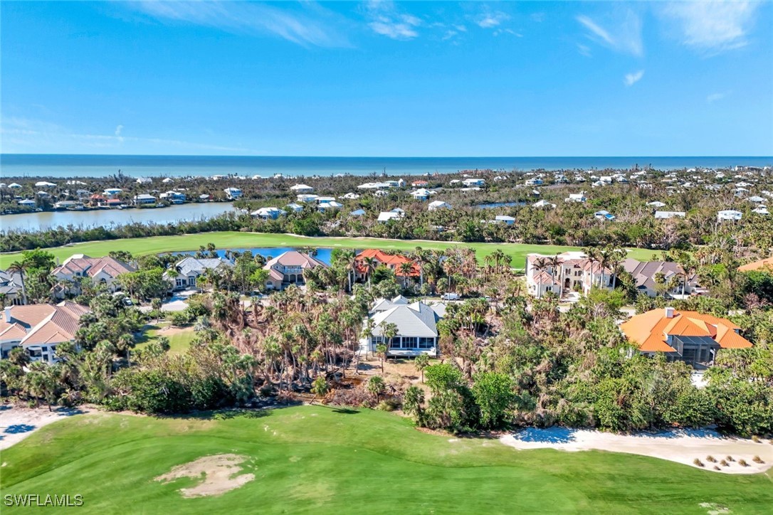 2450 Wulfert Road Sanibel, FL 33957 - Photo 10 of 44 an aerial view of multiple house with outdoor space