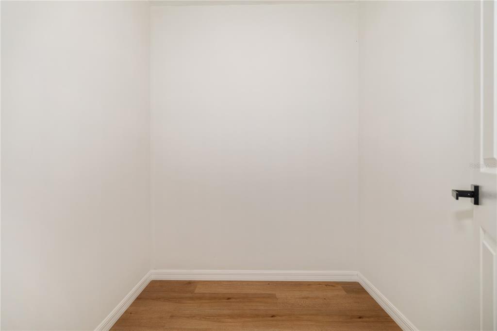 8916 Memorial Highway Tampa, FL 33615 - Photo 16 of 26 a view of small space with racks on the wall