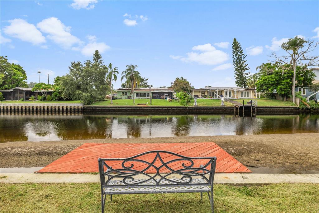 8916 Memorial Highway Tampa, FL 33615 - Photo 21 of 26 a view of a lake with a garden