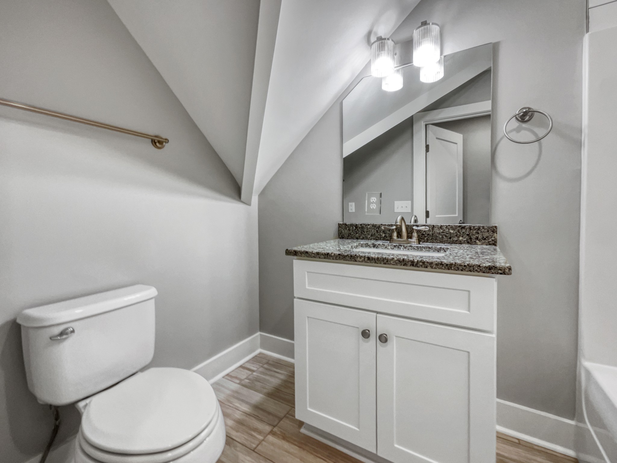 6650 Murfreesboro Road Lebanon, TN 37090 - Photo 24 of 27 a bathroom with a granite countertop toilet sink and mirror
