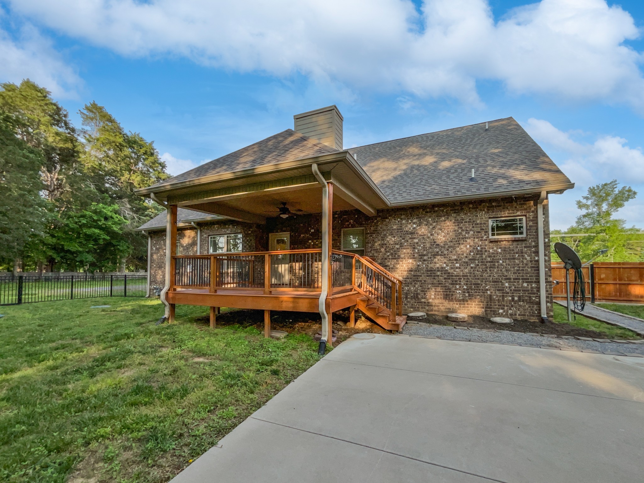 6650 Murfreesboro Road Lebanon, TN 37090 - Photo 27 of 27 a view of a house with a yard and sitting area