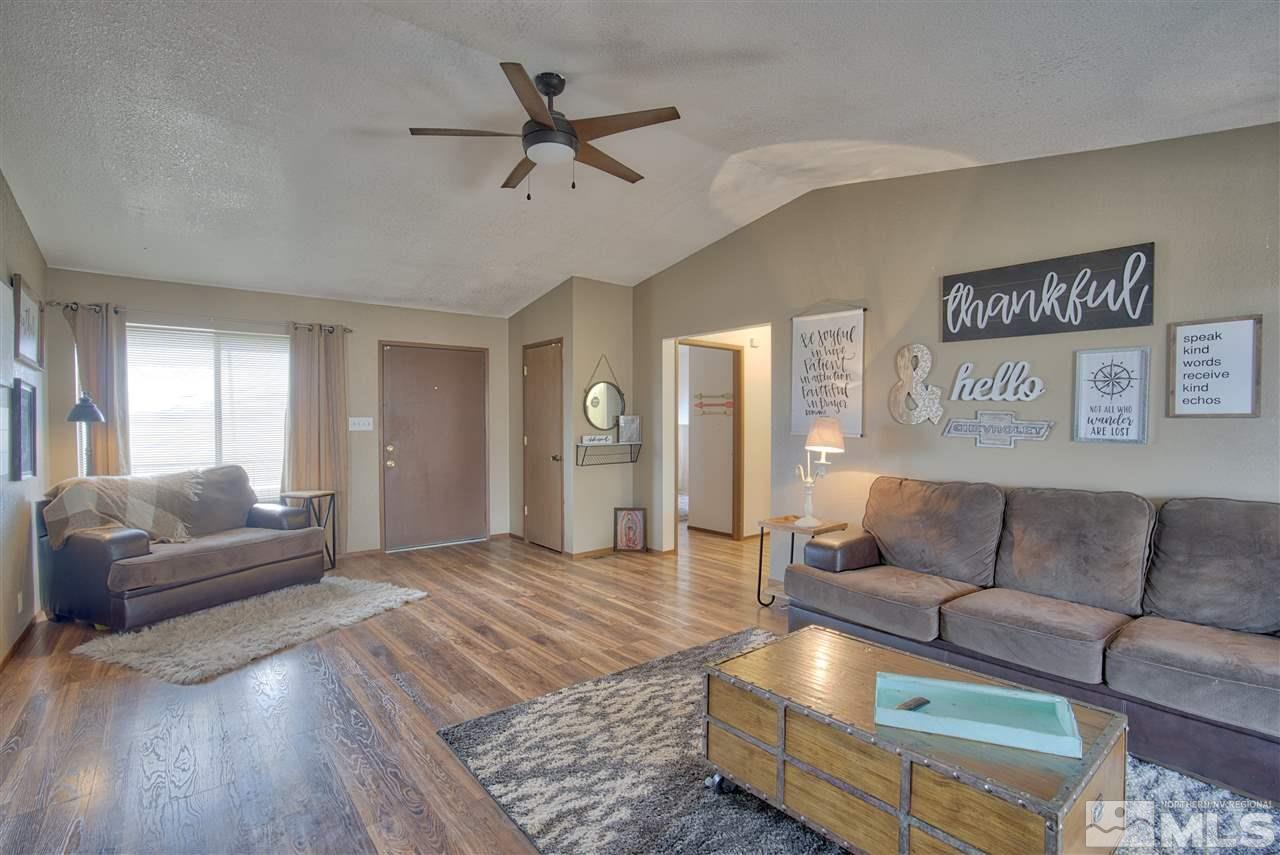 805 Hoge Road Reno, NV 89506 - Photo 3 of 17 a living room with furniture and a wooden floor