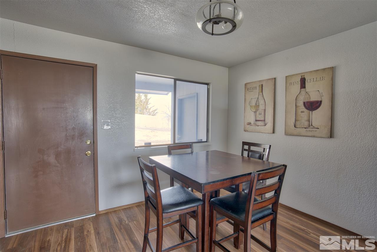 805 Hoge Road Reno, NV 89506 - Photo 6 of 17 a view of a dining room with furniture and window