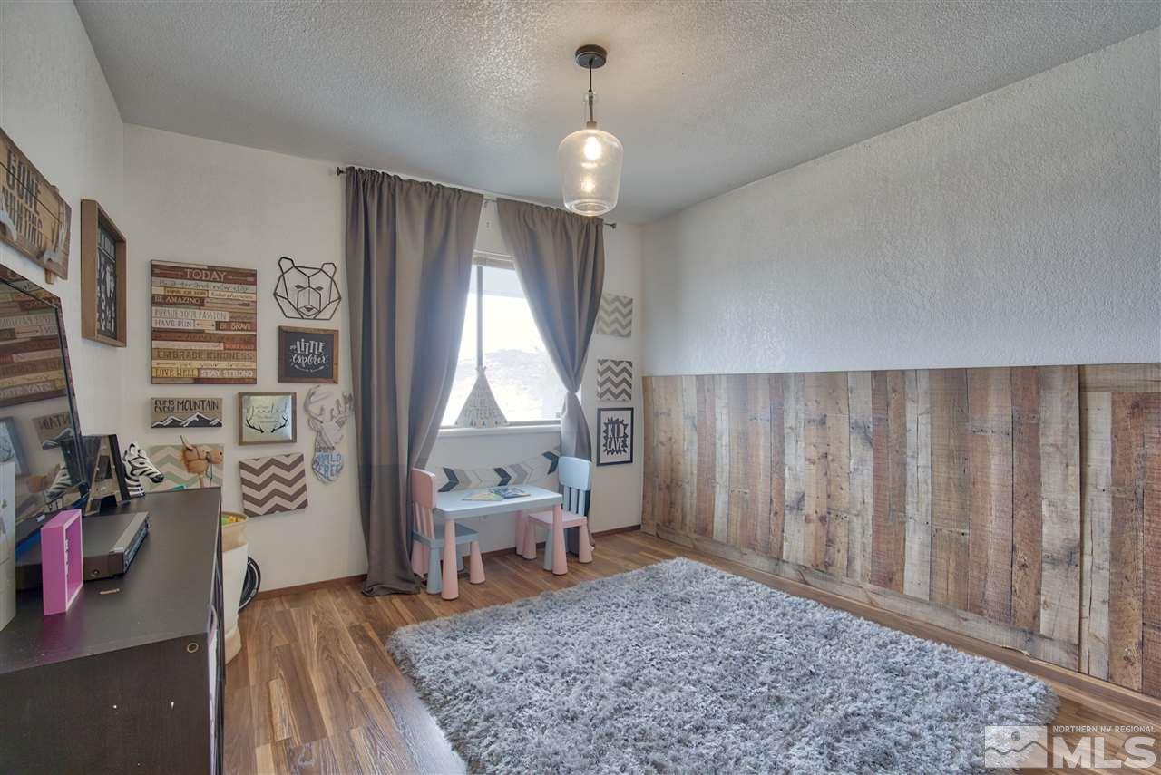 805 Hoge Road Reno, NV 89506 - Photo 8 of 17 a living room with furniture and a window
