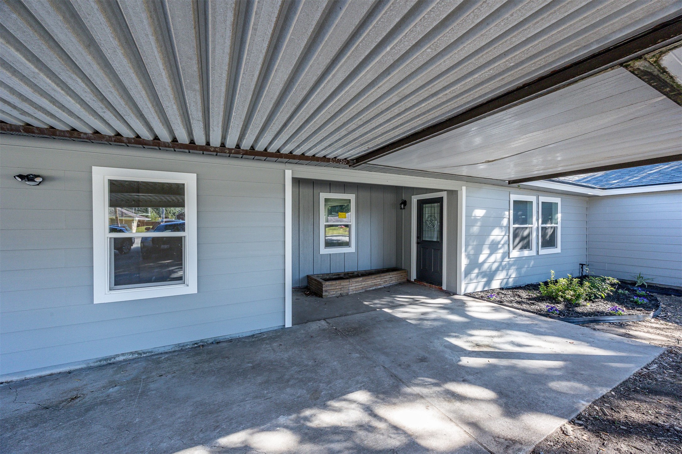1108 18th Street Nederland, TX 77627 - Photo 15 of 30 front port-a-cache / porch