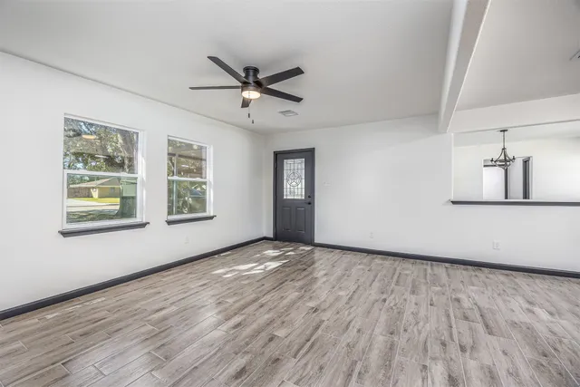 a kitchen with stainless steel appliances granite countertop a stove sink and cabinets