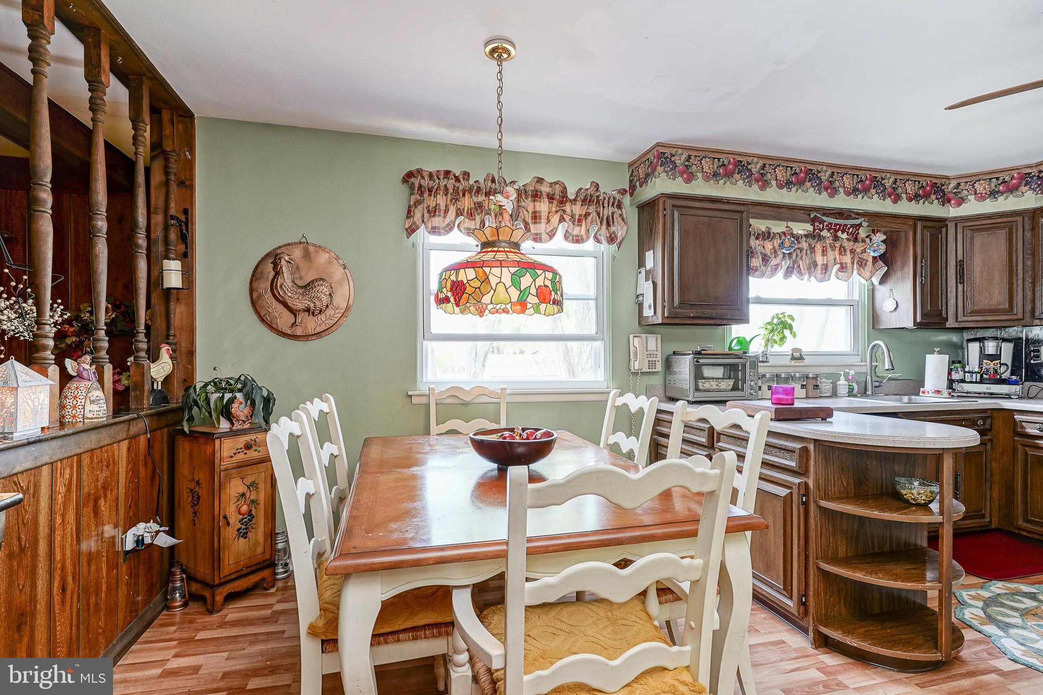 118 Golfview Drive Sewell, NJ 08080 - Photo 12 of 39 a view of a dining area with furniture and a chandelier
