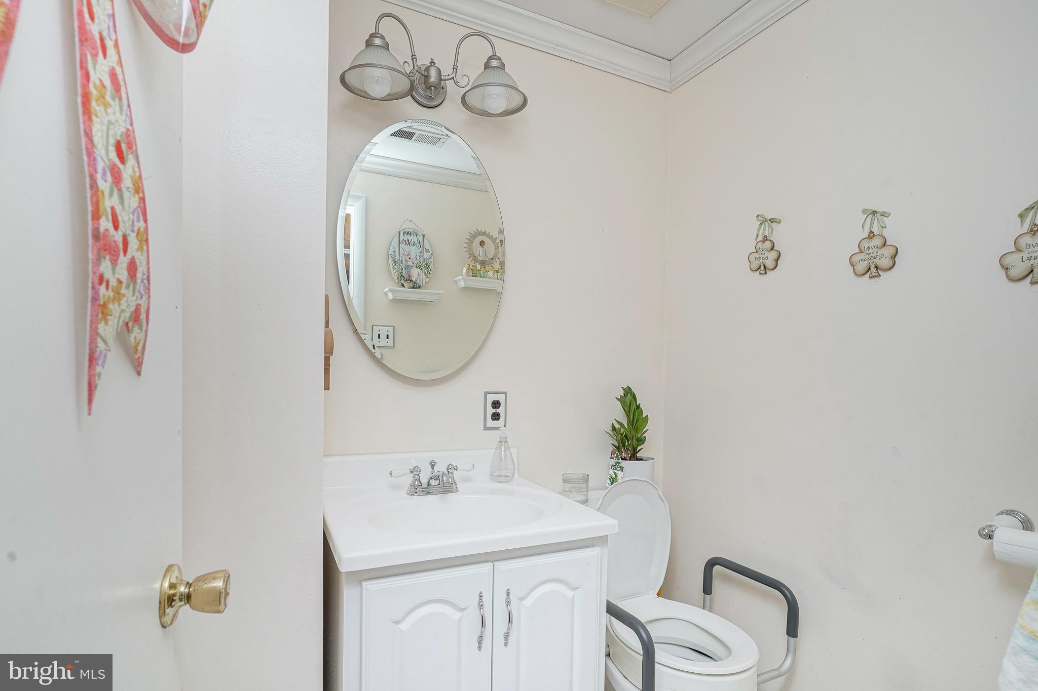 118 Golfview Drive Sewell, NJ 08080 - Photo 17 of 39 a bathroom with a sink mirror and toilet