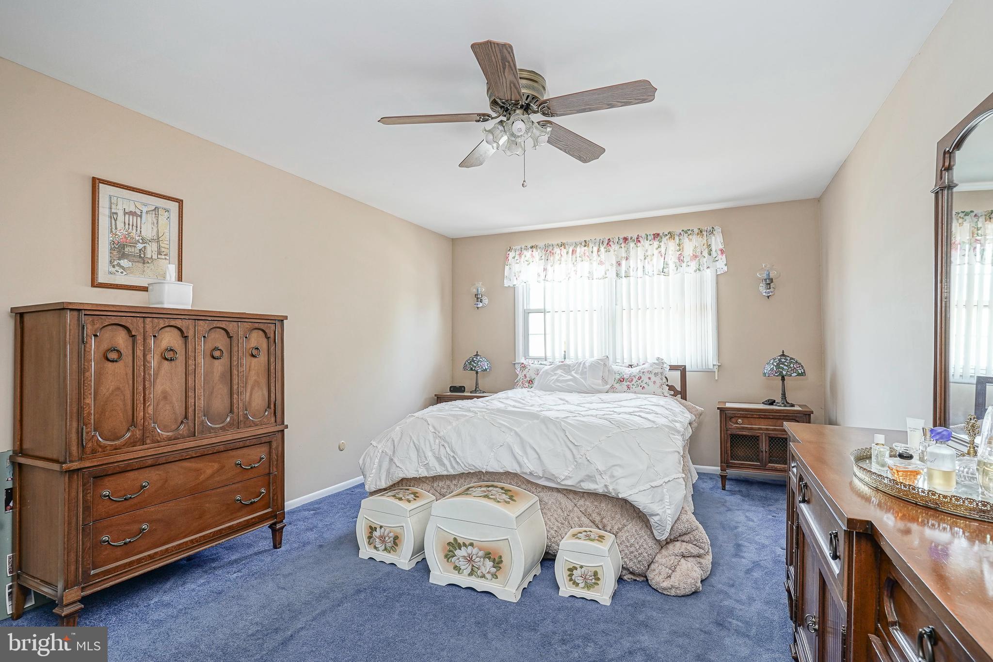 118 Golfview Drive Sewell, NJ 08080 - Photo 21 of 39 a spacious bedroom with a bed next to a window