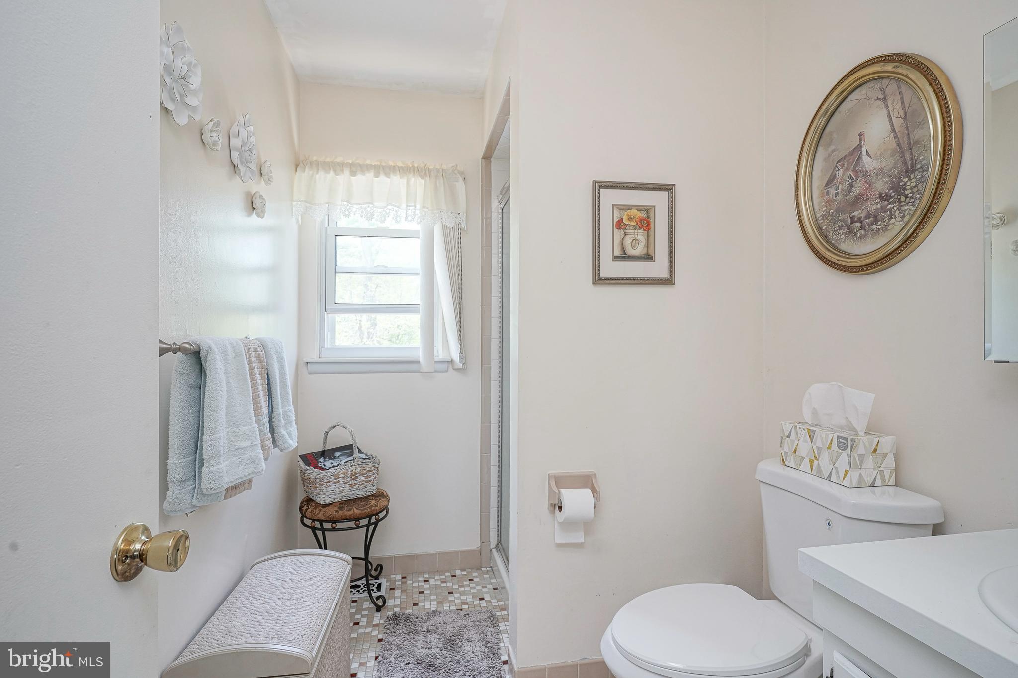 118 Golfview Drive Sewell, NJ 08080 - Photo 23 of 39 a white toilet sitting next to a bathroom sink