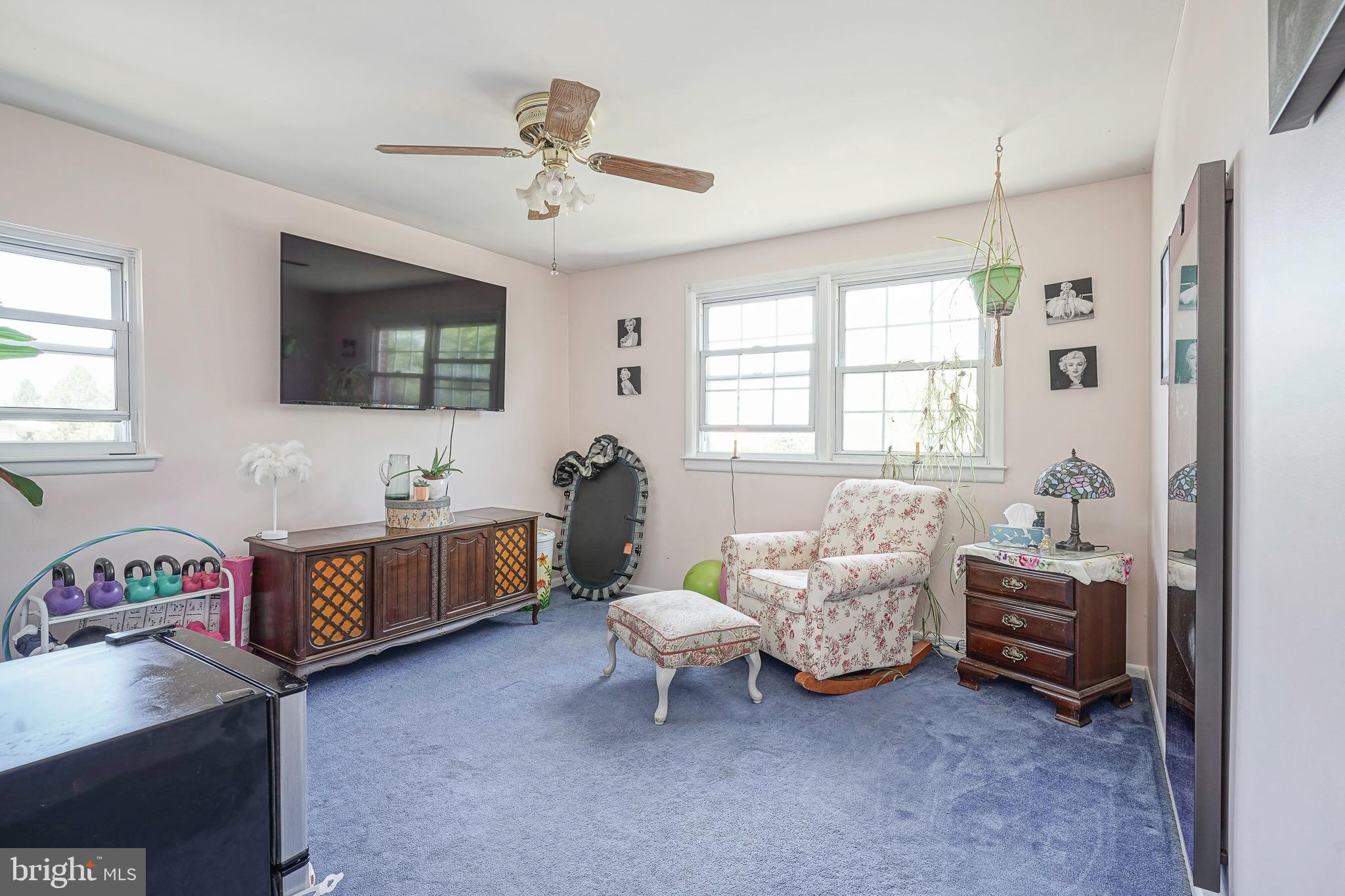 118 Golfview Drive Sewell, NJ 08080 - Photo 27 of 39 a spacious bedroom with a bed and a flat screen tv