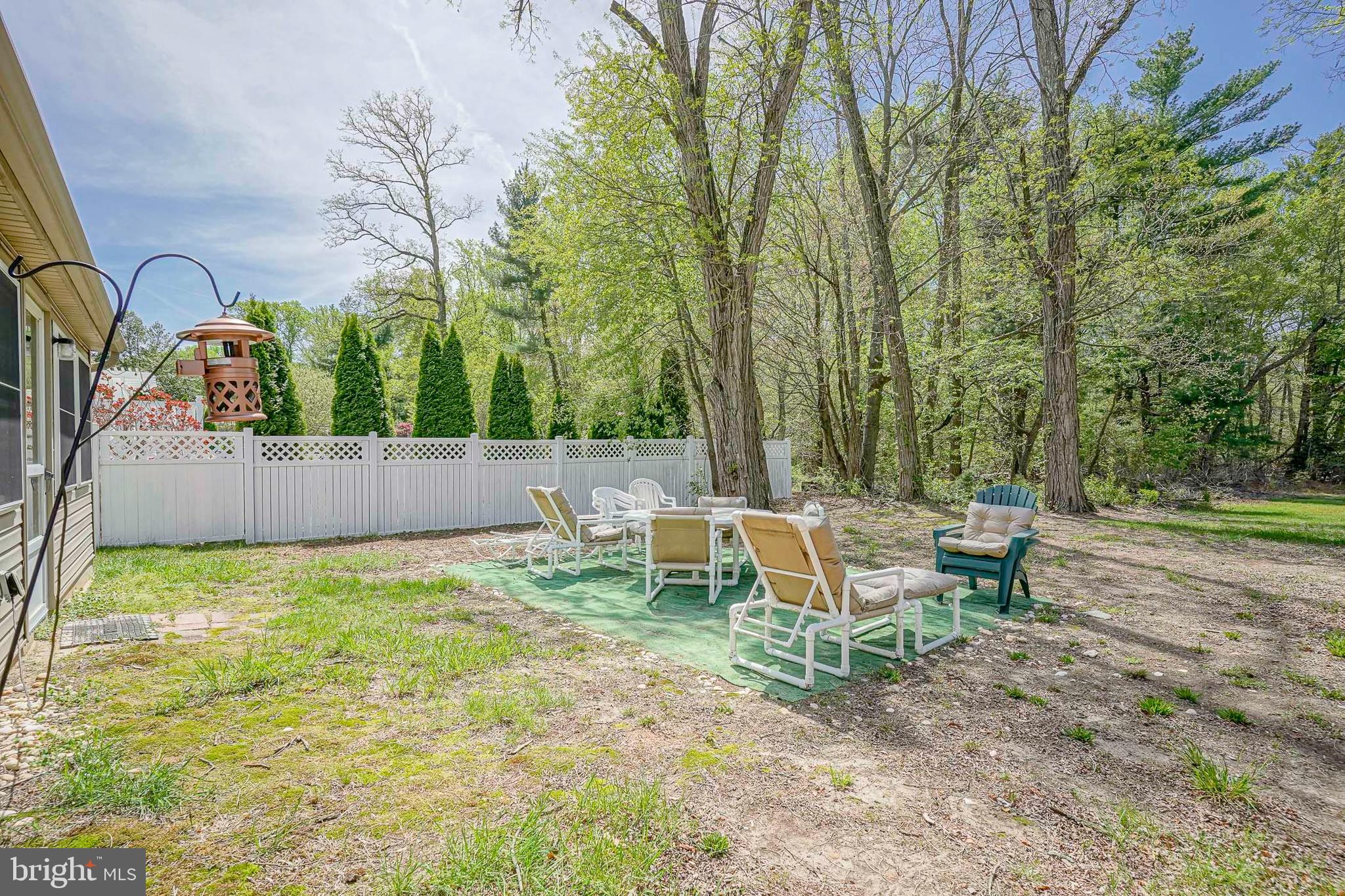 118 Golfview Drive Sewell, NJ 08080 - Photo 34 of 39 a backyard of a house with table and chairs