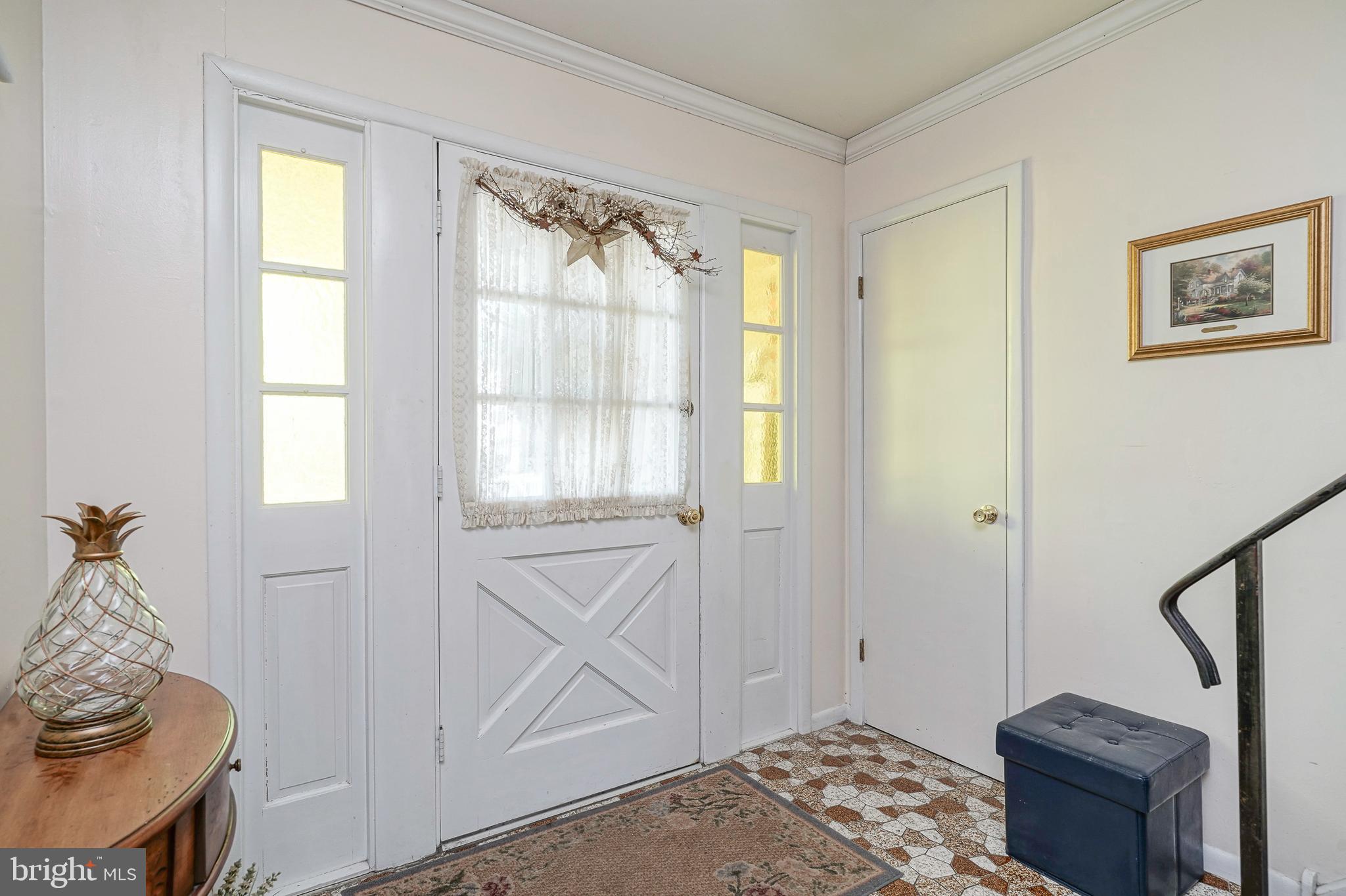 118 Golfview Drive Sewell, NJ 08080 - Photo 4 of 39 a view of a livingroom with wooden floor and a window