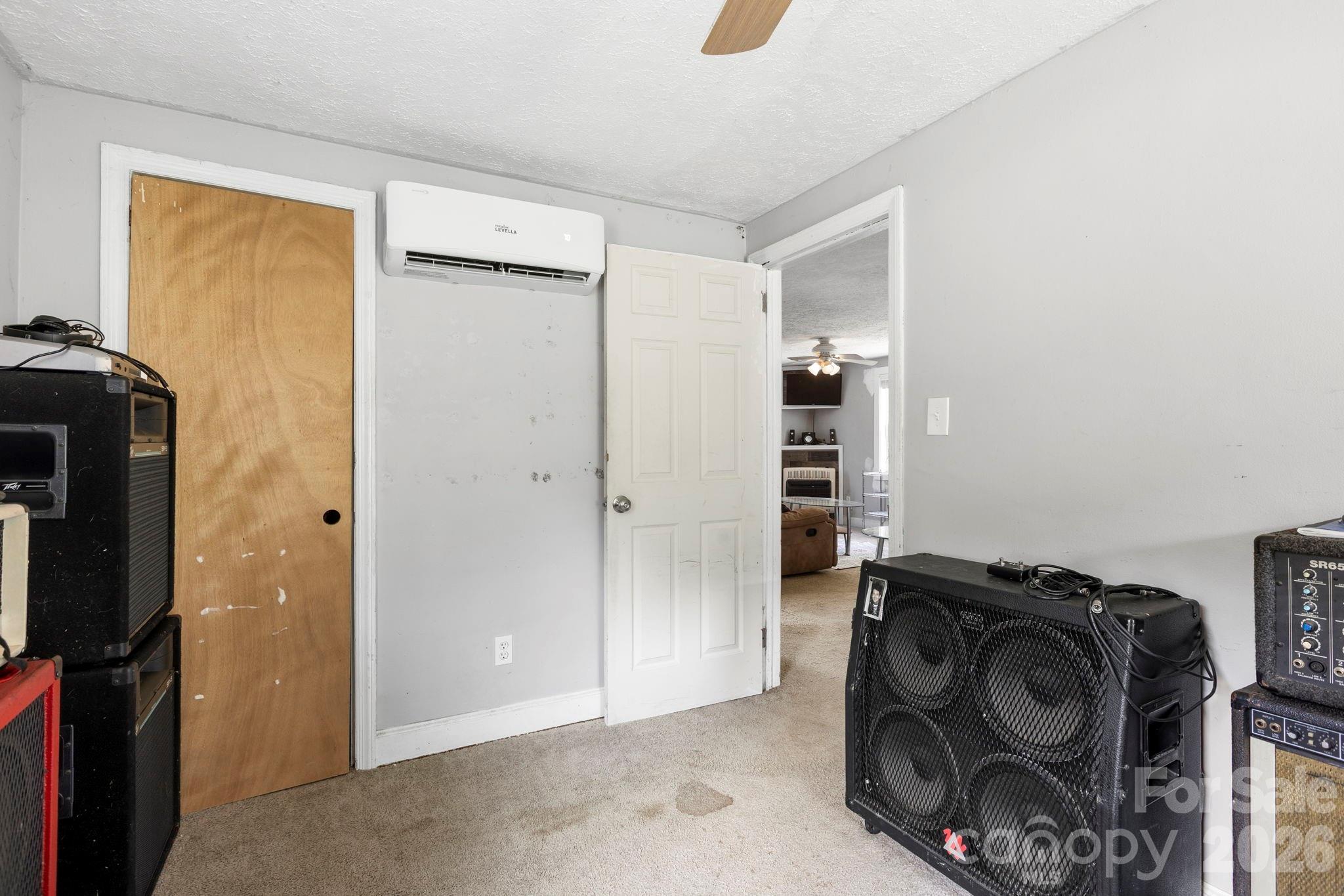 4 Mountain View Road Asheville, NC 28806 - Photo 12 of 35 a view of walk in closet with clothes and shoes