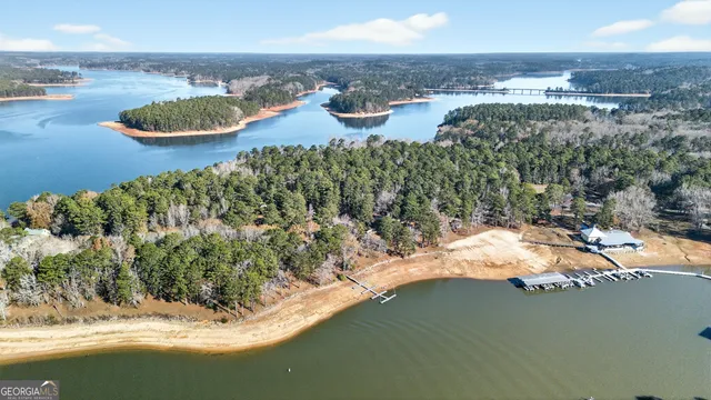 a bedroom with furniture and window