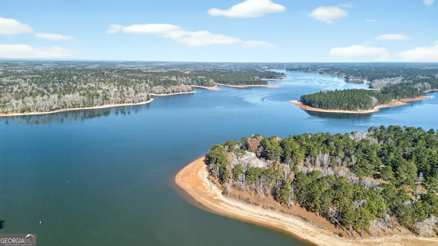 a spacious bathroom with a double vanity sink and a mirror