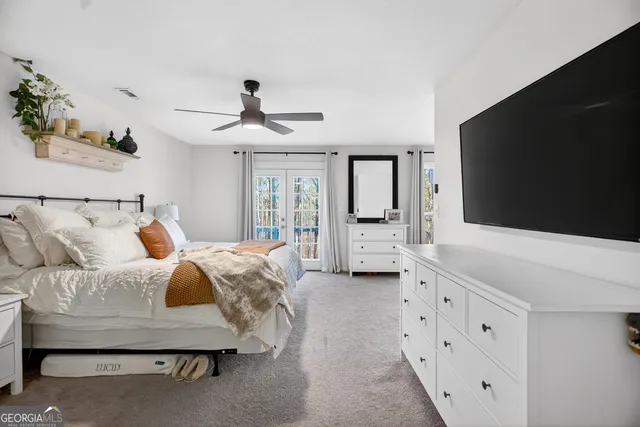 a kitchen with stainless steel appliances a refrigerator and a window