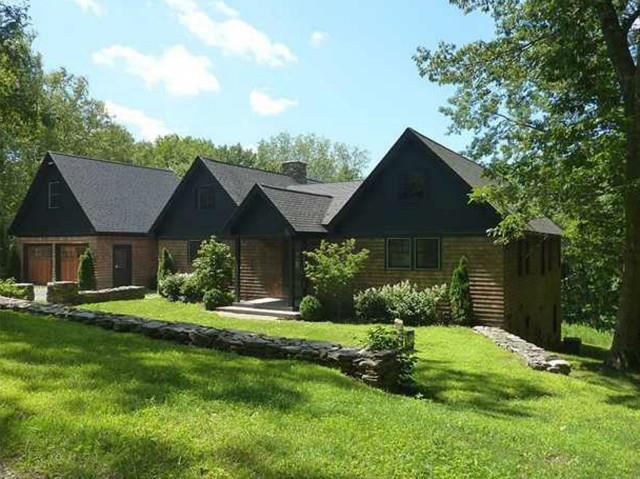 429 Cornwall Bridge Road Sharon, CT 06069 - Photo 1 of 1 a front view of a house with a yard