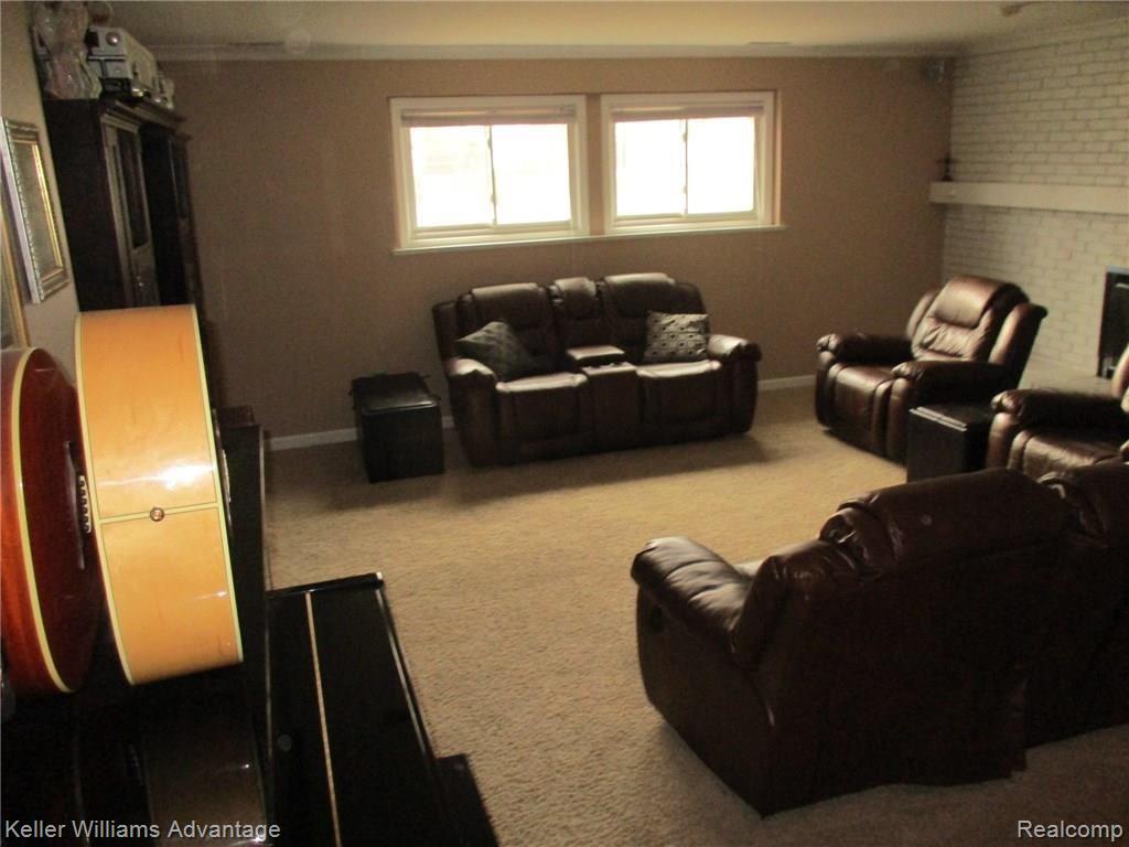 29911 High Valley Road Farmington, MI 48331 - Photo 39 of 53 The basement recreation room for fun times with friends and family.