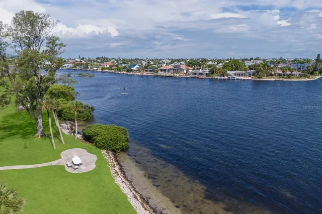 a view of a lake with a city view
