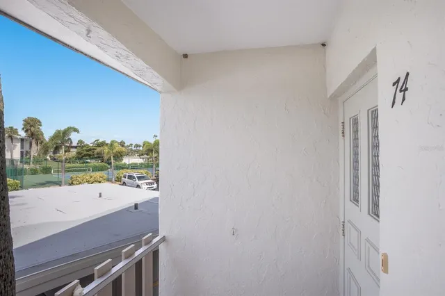 a view of a room with furniture and garden