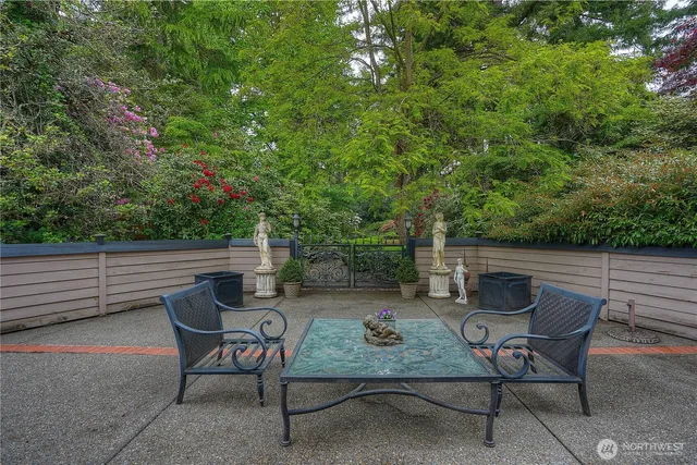a view of backyard with furniture and outdoor seating