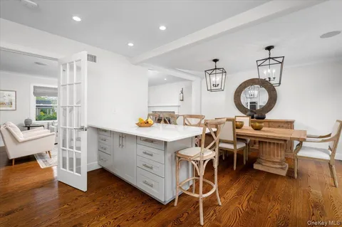 a workspace with furniture and wooden floor