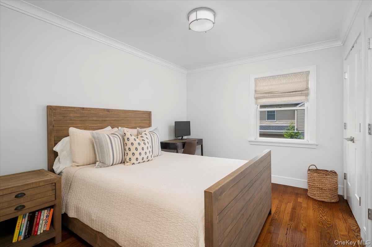 33 Temple Street Harrison, NY 10528 - Photo 21 of 31 a bed room with a bed and a window