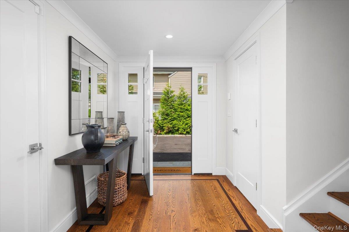 33 Temple Street Harrison, NY 10528 - Photo 3 of 31 a view of a workspace with furniture and a window