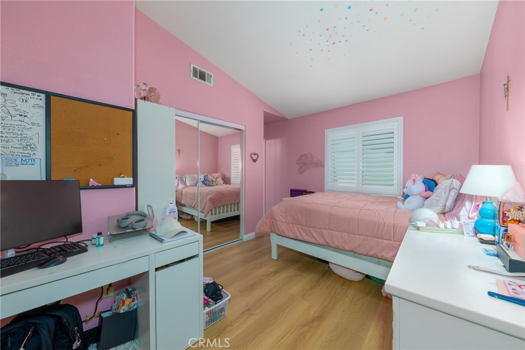 23220 Colony Park Drive Carson, CA 90745 - Photo 19 of 34 a bedroom with a bed and a desk