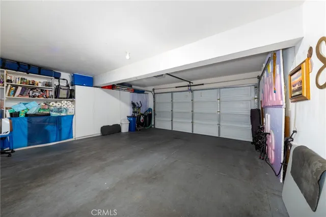 a view of a garage with storage