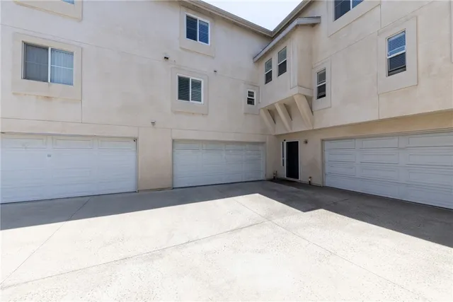 a view of backyard with garage