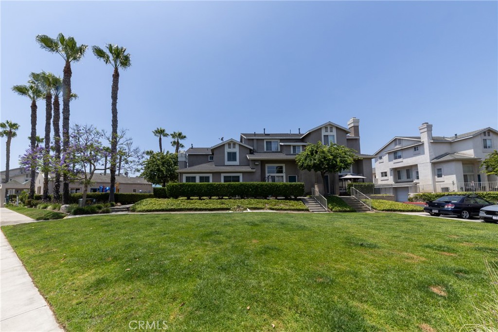 23220 Colony Park Drive Carson, CA 90745 - Photo 29 of 34 a front view of multiple houses with yard