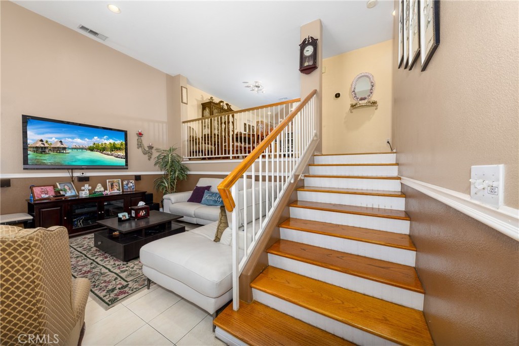 23220 Colony Park Drive Carson, CA 90745 - Photo 3 of 34 a living room with furniture and a flat screen tv
