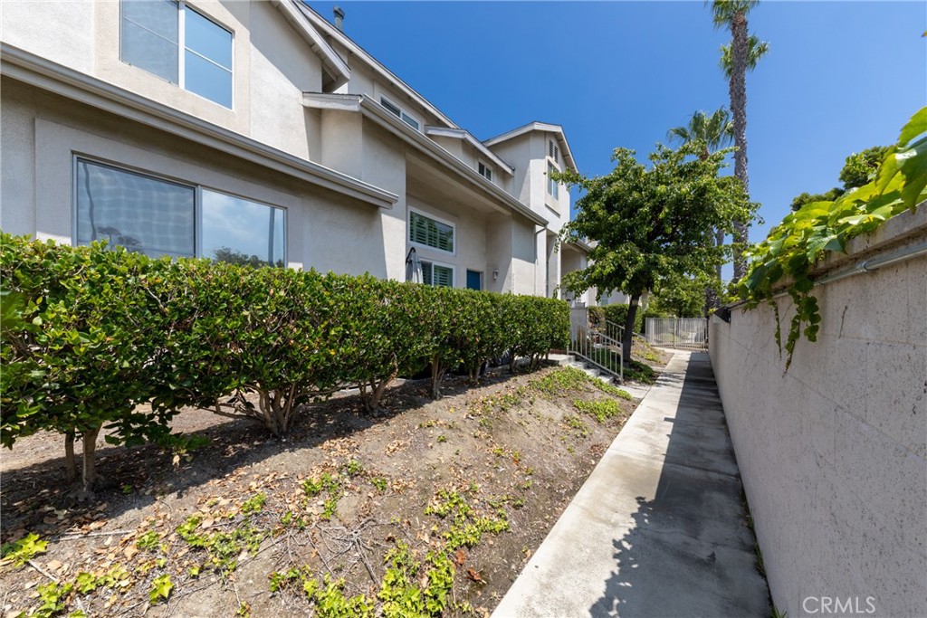 23220 Colony Park Drive Carson, CA 90745 - Photo 34 of 34 a view of a house with a flower garden