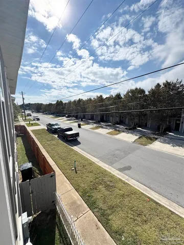 a view of swimming pool with furniture
