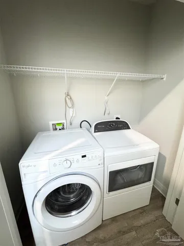 a utility room with dryer and washer