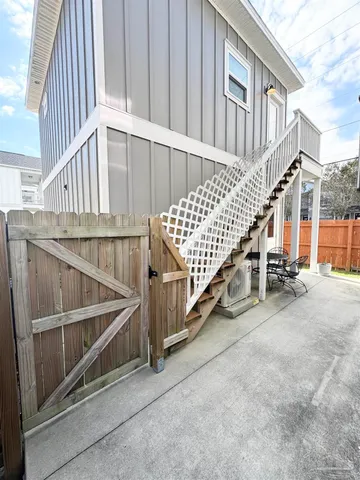 a view of entryway with wooden floor