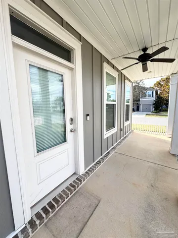 a view of a porch of a house