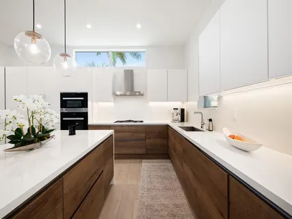 a view of a living room with clothes and shoes