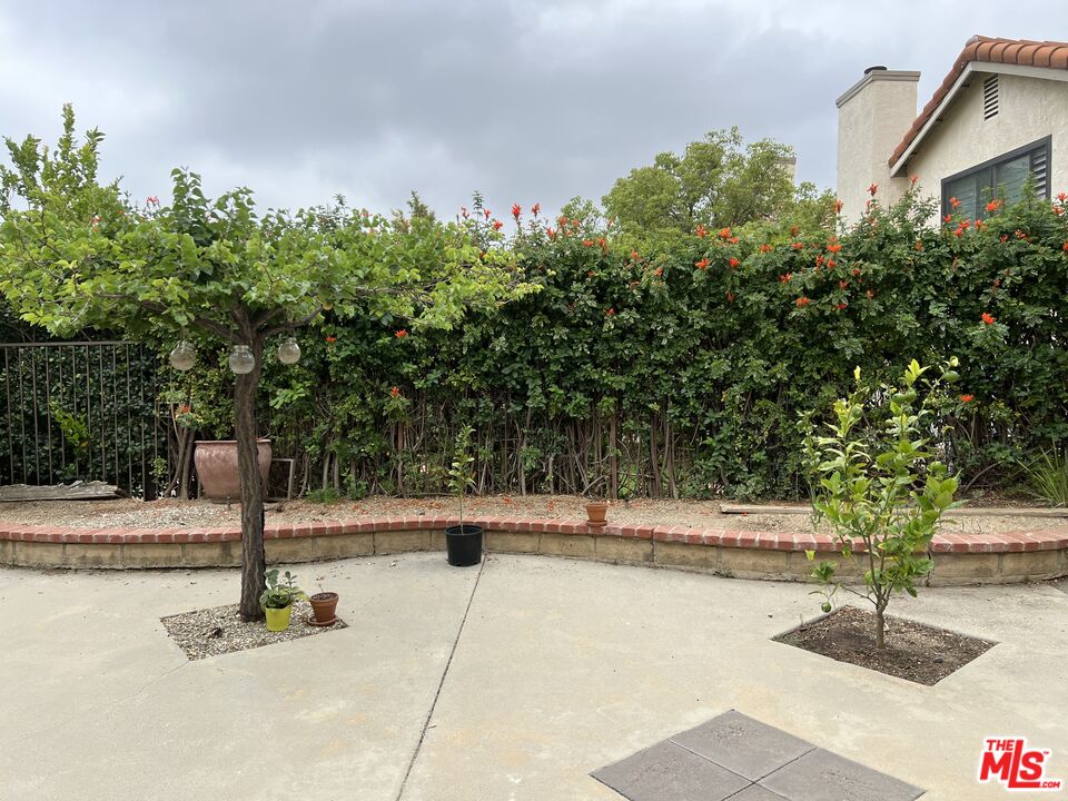 19528 Eagle Ridge Lane Porter Ranch, CA 91326 - Photo 15 of 20 a swimming pool with an outdoor space
