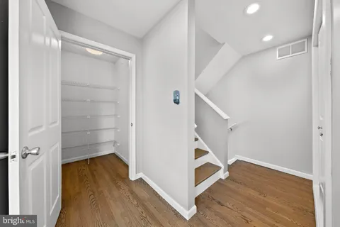 a view of entryway with wooden floor