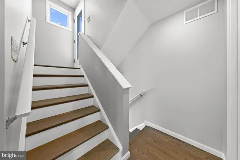 a bedroom with bed and window