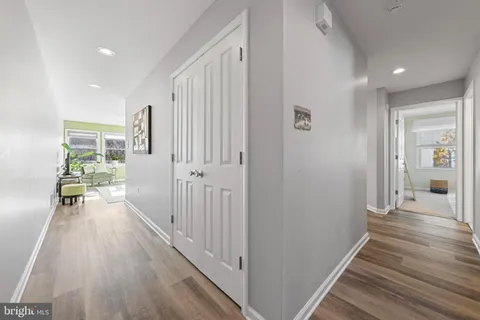 a bedroom with two beds and a window